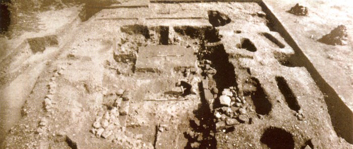 A photo of the burial site in the vicarage garden, seen from the west.